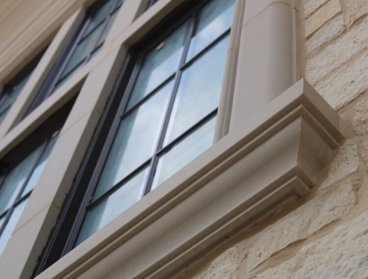 Detail of cast stone window sill and surrounds