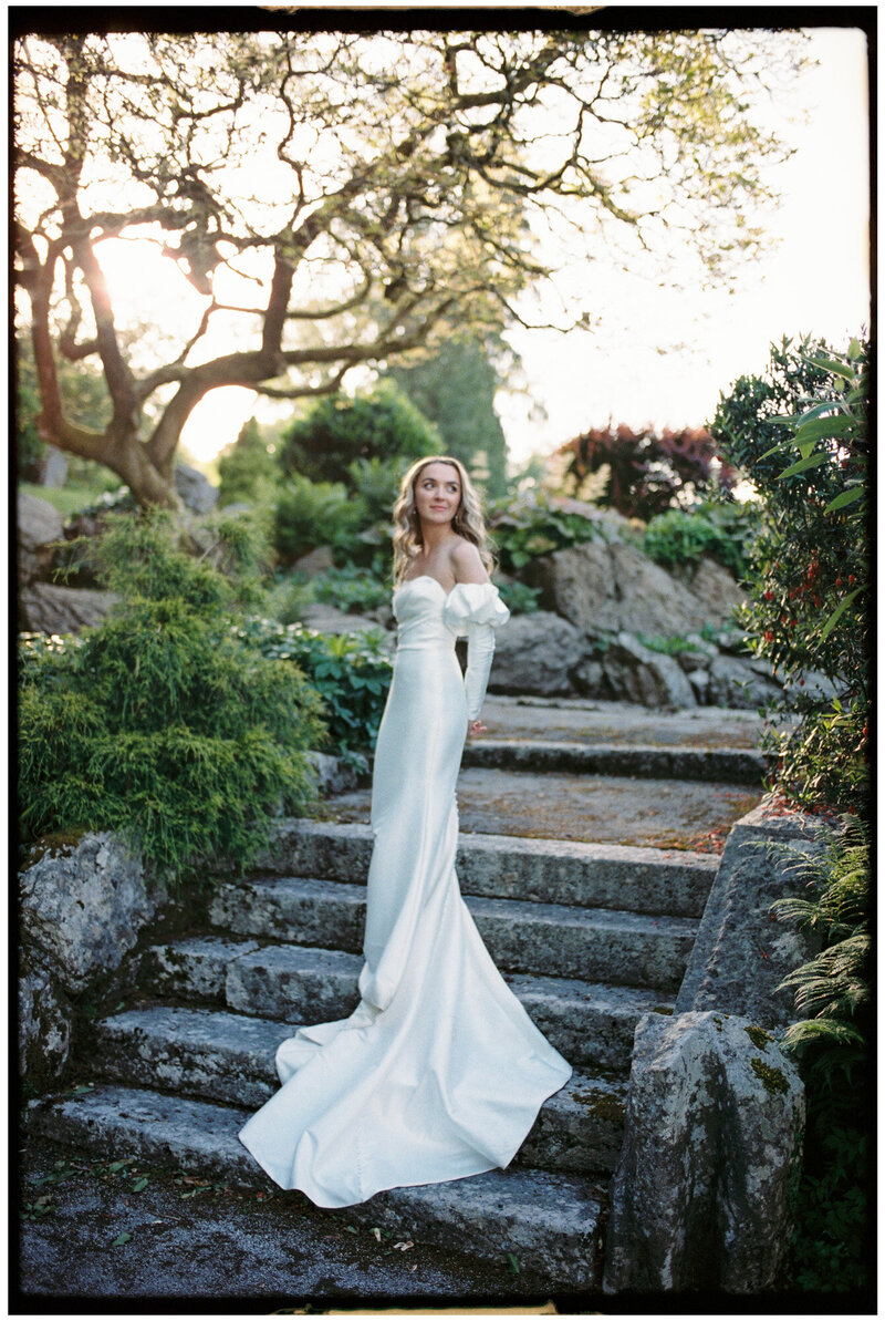 stylish wedding portrait of a bride on 35mm film in fashionable wedding dress