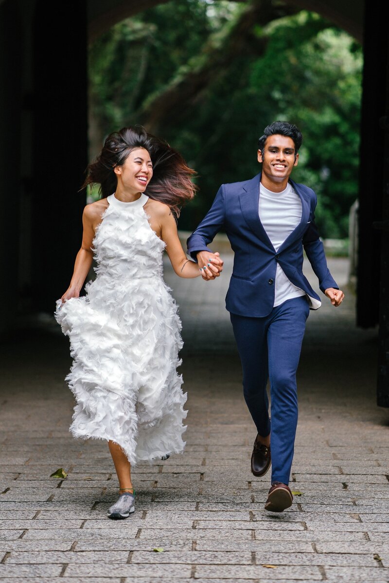 bride and groom running