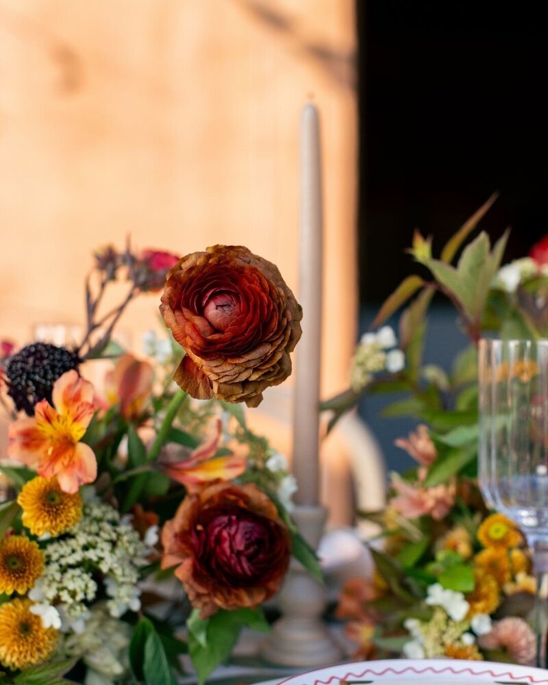bright colorful head table floral design