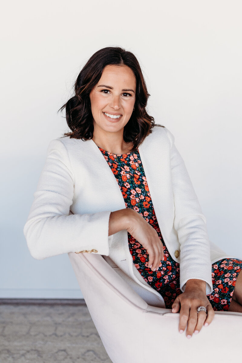 Lauryn DeNenno, Family Concierge Real Estate Expert. Lauryn’s warm and approachable demeanor reflects her commitment to helping families find their perfect home.
