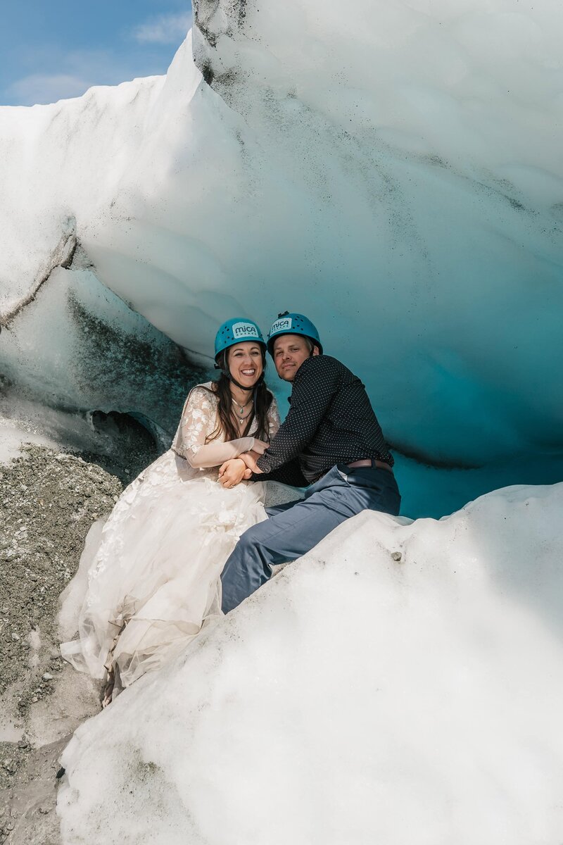 Bride and groom swooning at Paradise Meadow in Glacier National Parn
