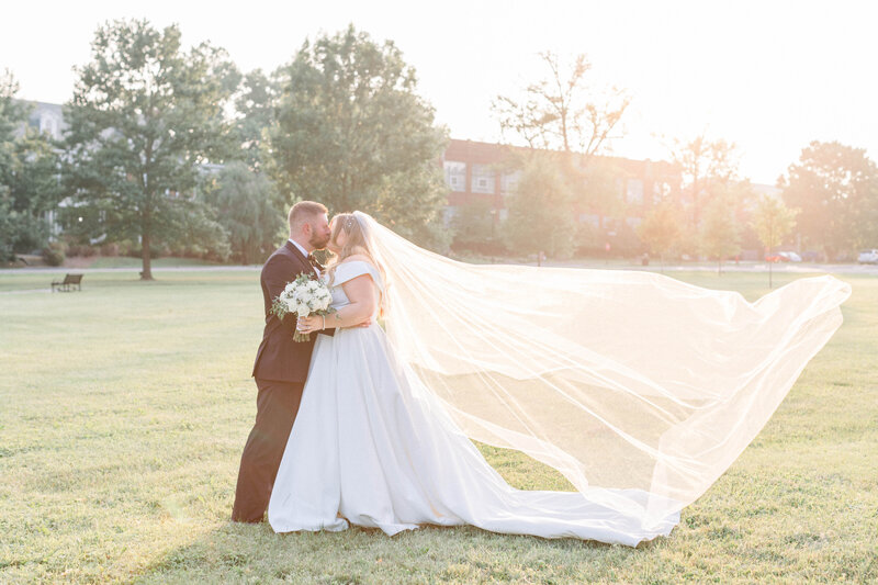 bride and groom photographs at sunset