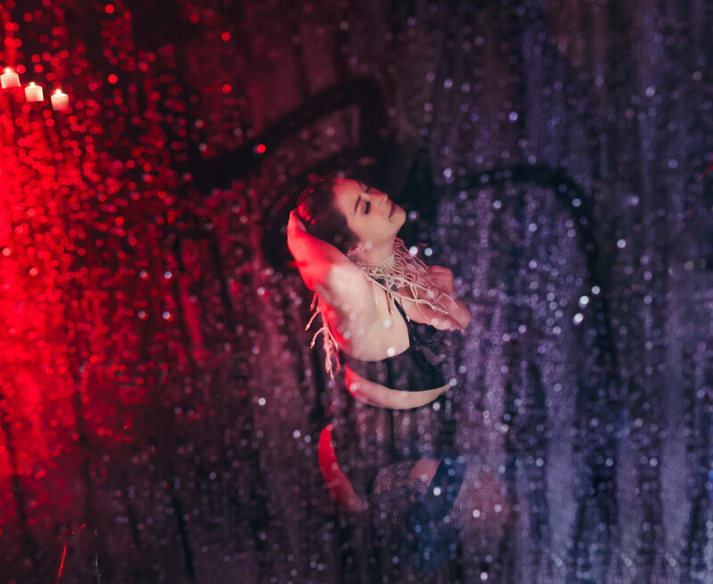 savannah-boudoir-rain-shower-session-with-beautiful-brunette-with-red-mood-lighting-sparkles