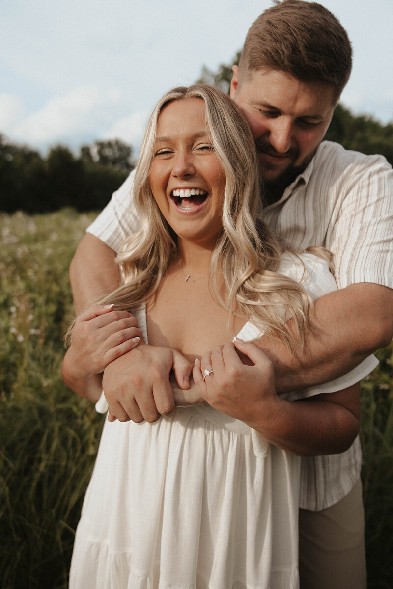 classic film engagement photos for save the date invitations. wine and picnic date and romantic dancing in field is perfect for casual photos