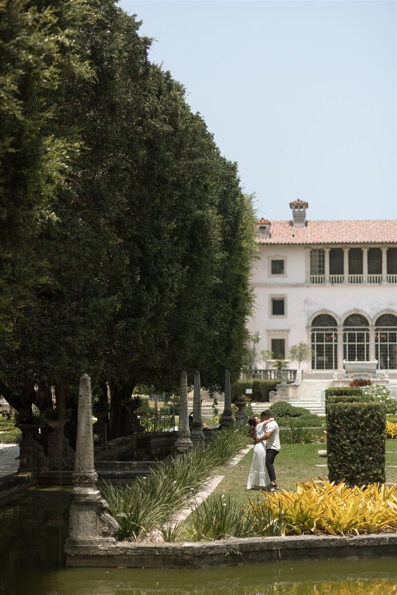 Romantic engagement photos at European wedding venue in Miami Florida named Vizcaya Museum by Janel Herranz Photography