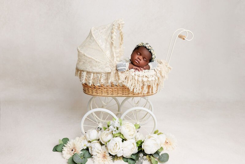 Baby in a vintage stroller