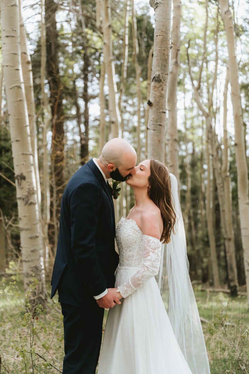 Bride and groom kissing