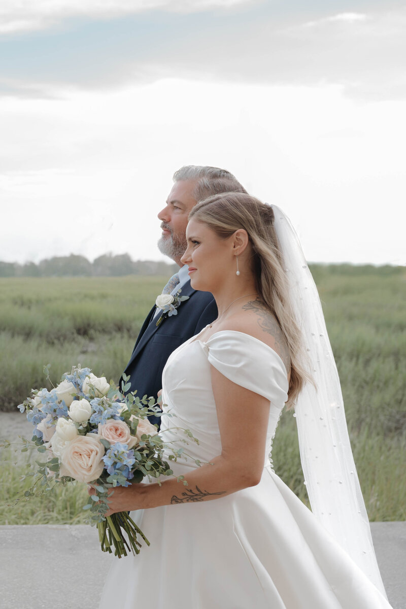 a bride walks down the aisle to her groom on their wedding day in San Antonio, Texas.