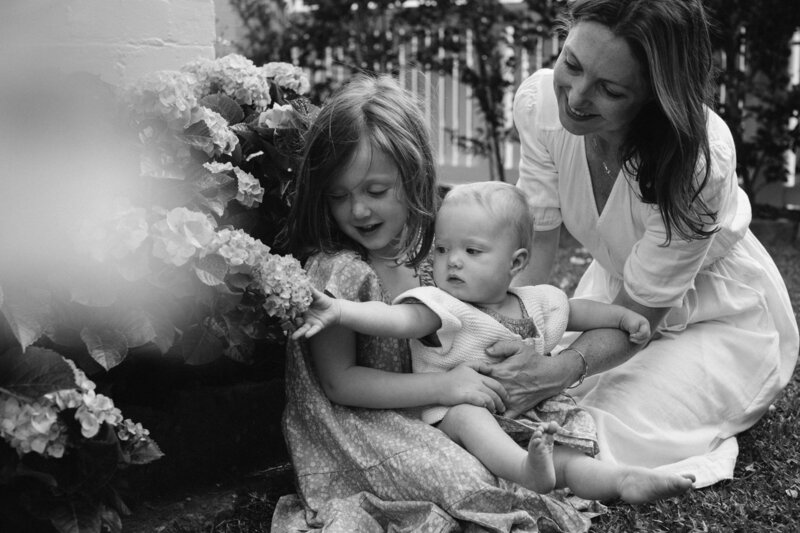 A relaxed family photoshoot in the garden with hydrangeas, by Tealily Photography in Sydney