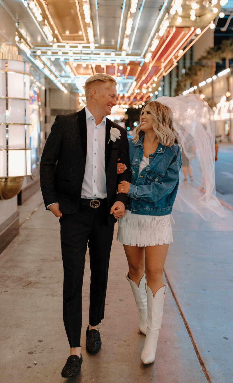 cute-just-married-in-vegas-couple-walking-down-street