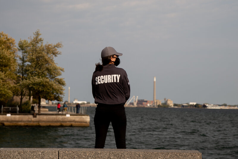 closeup-shot-of-a-female-security-guard-in-uniform-2023-11-27-05-00-50-utc