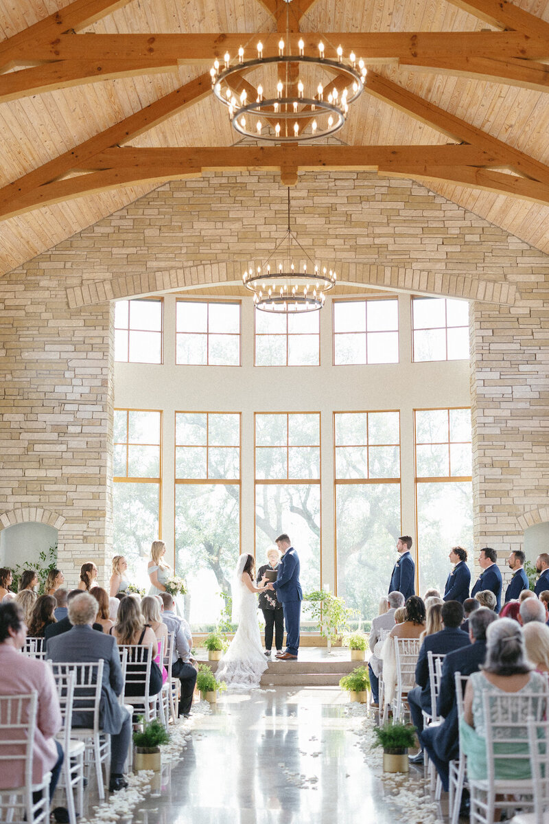 Indoor chapel ceremony at Canyonwood Ridge with modern architecture and soft light