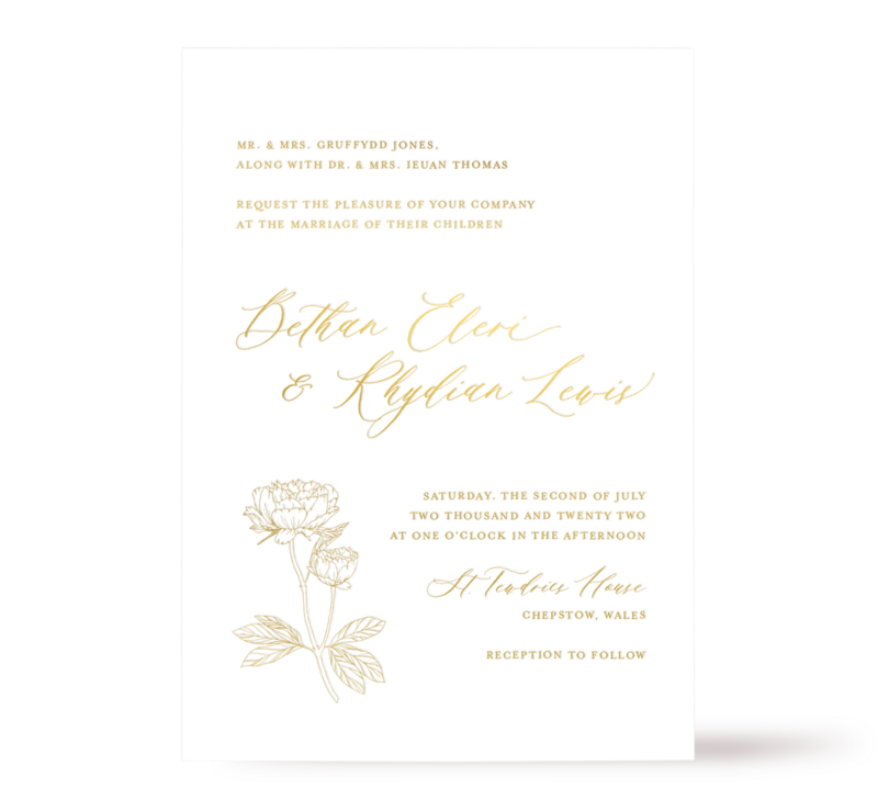 A sophisticated gold foil wedding invitation with intricate peonies illustration.
