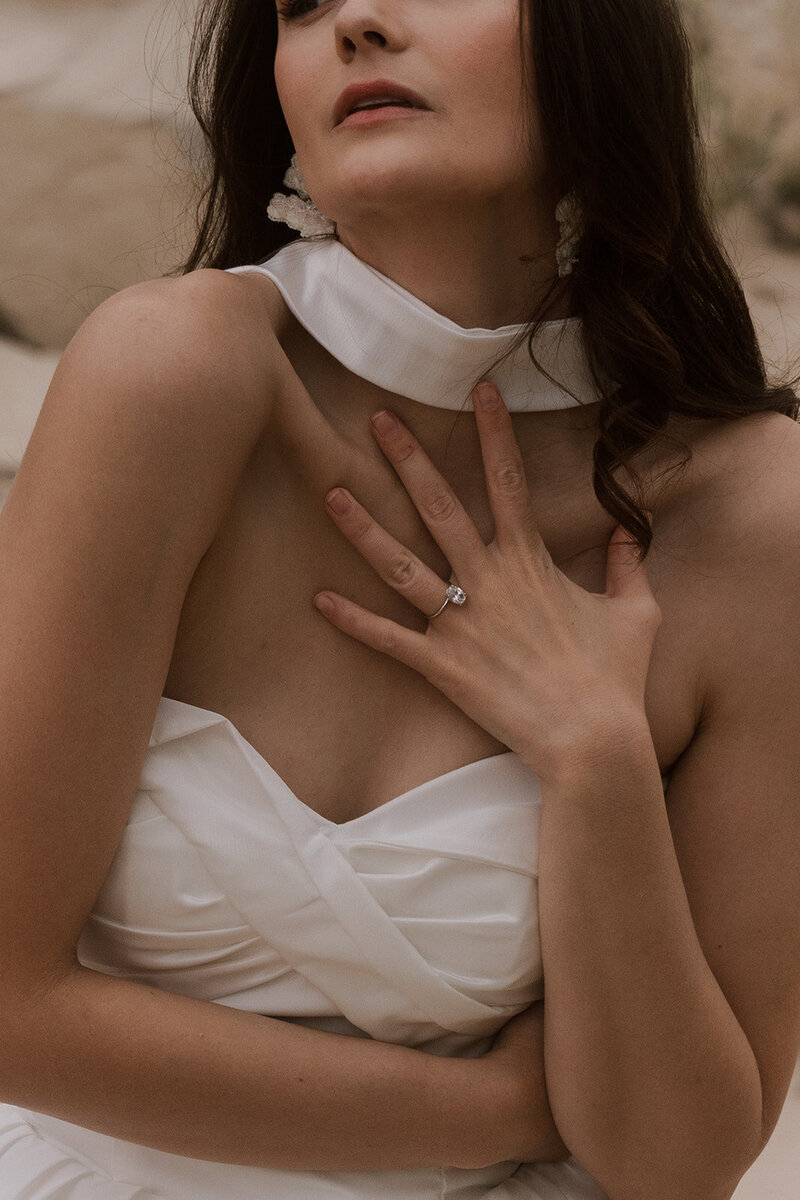 bride showing off wedding ring