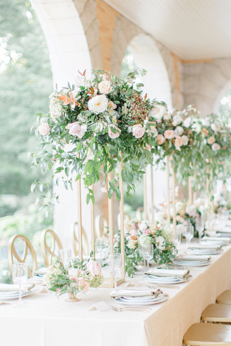 Wedding table setting with lush florals