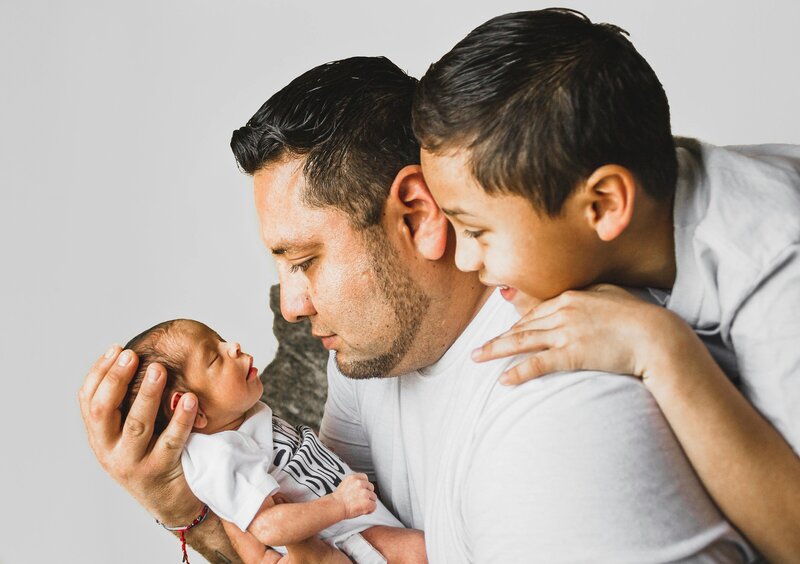 Picture of. Dad Holding Baby