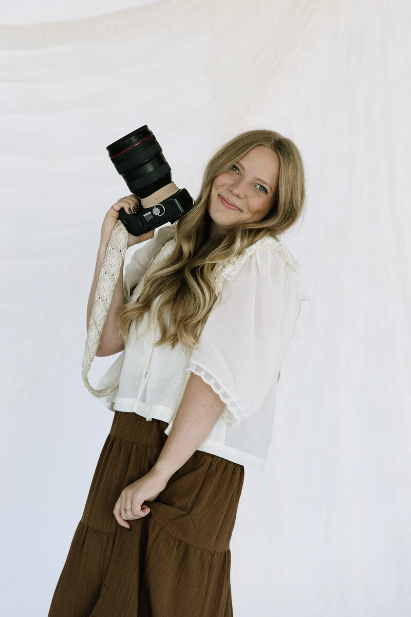 Portrait of Brenna Rieth, wedding, maternity, and newborn photographer based in North Dakota + Minnesota.