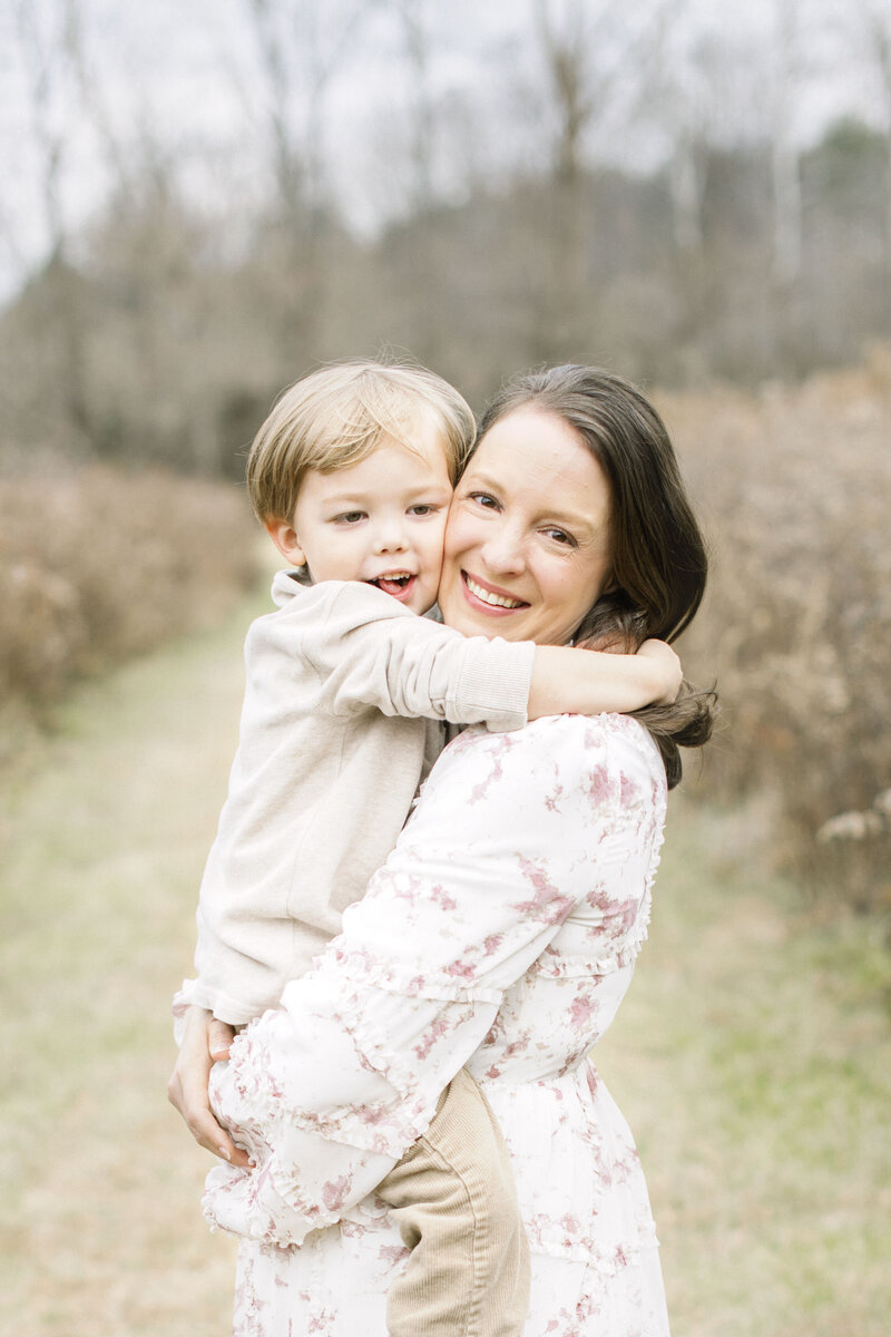 Winston-Salem photographer Emily Richardson holding her child