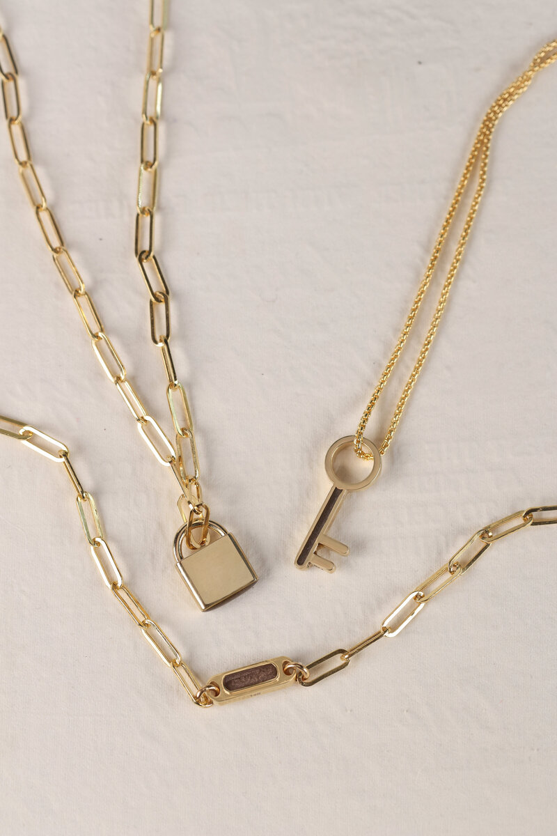gold chain link jewelry flat lay photographer
