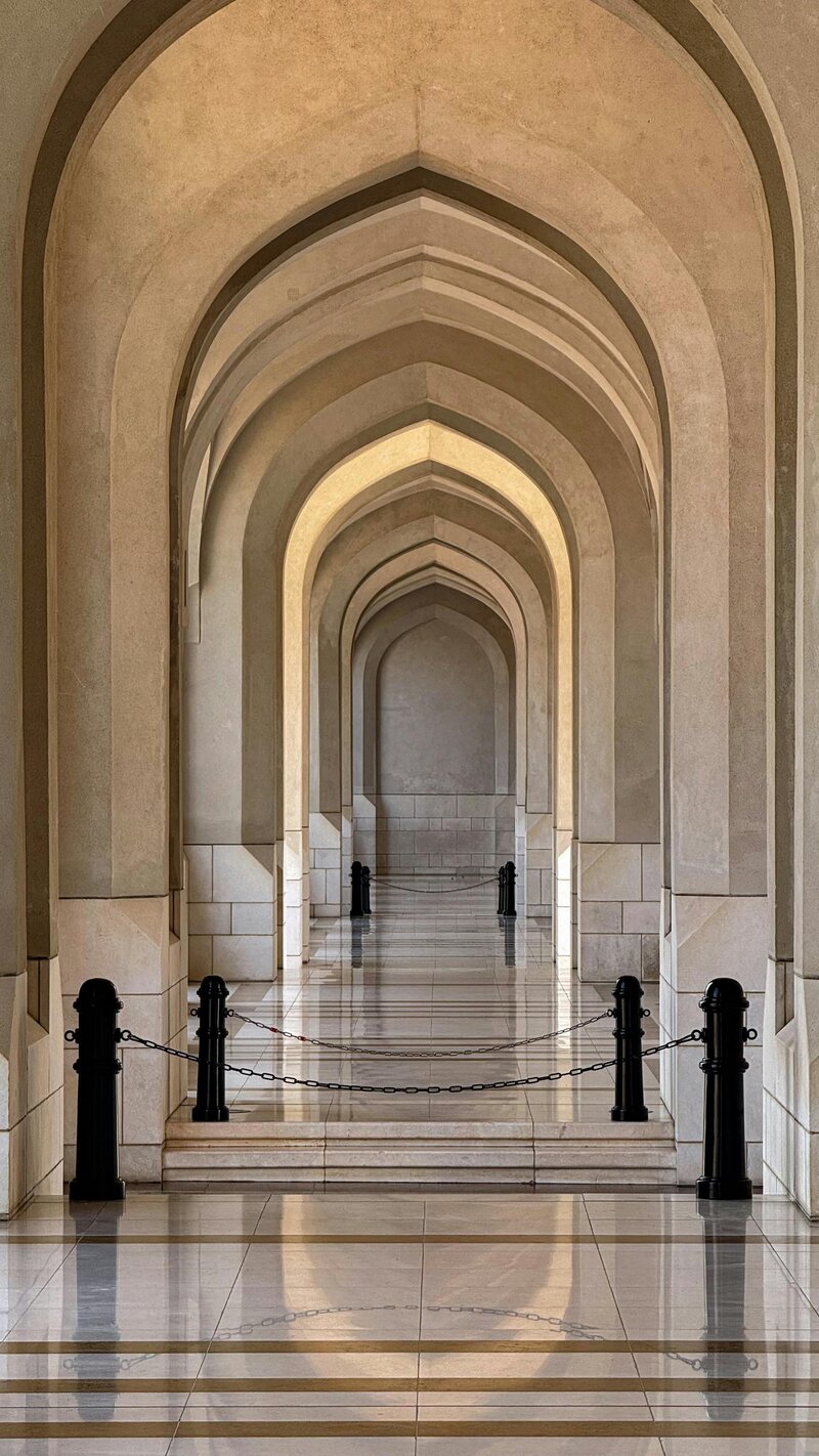 Elegant architectural arches representing purposeful design choices in the 'Design with Intention' phase