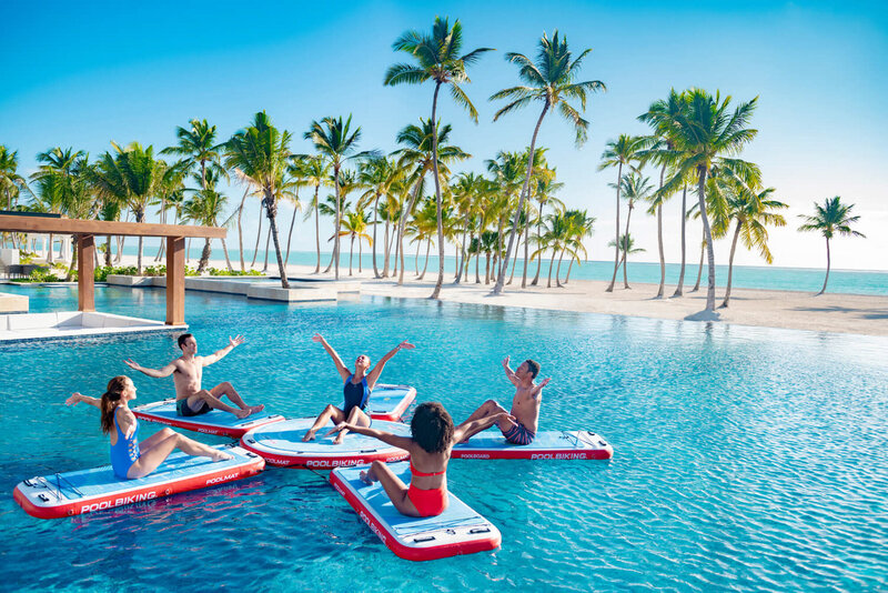 Friends on a floater in the ocean