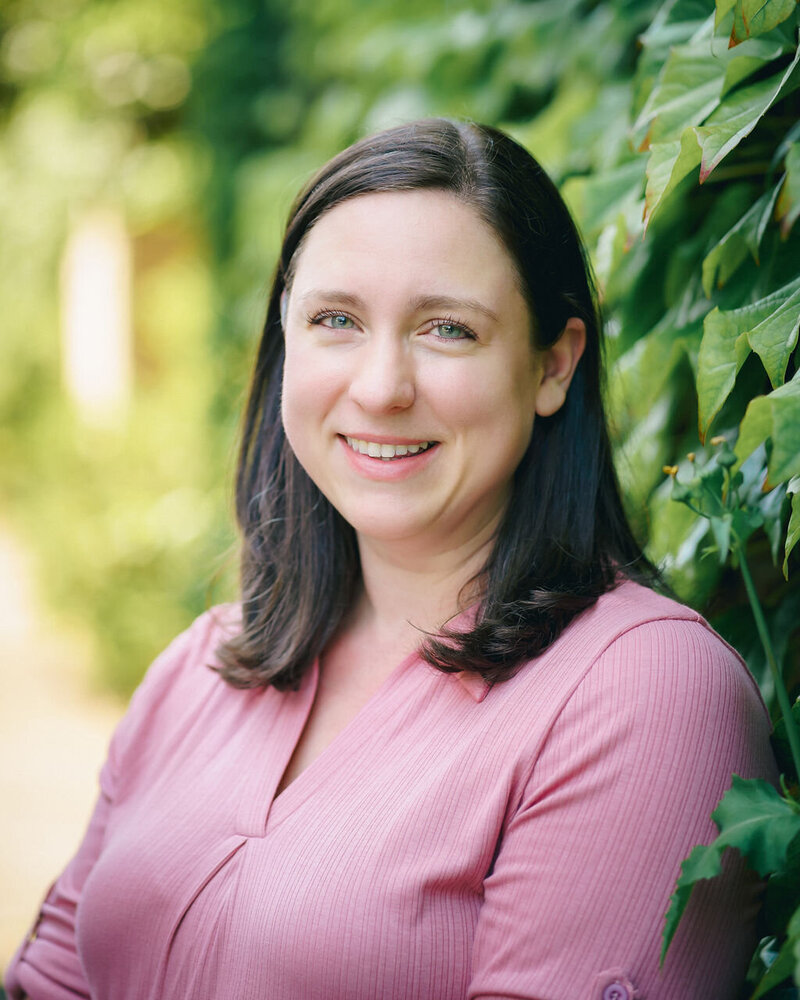 Professional headshot of small business copywriter Kat Jackson