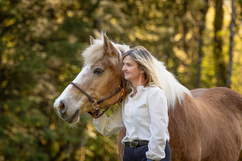 healing with horses, woman and horse connecting on ground
