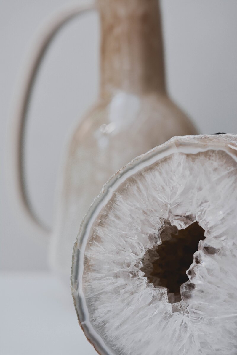Aesthetic neutral image of pottery and crystal for abundance