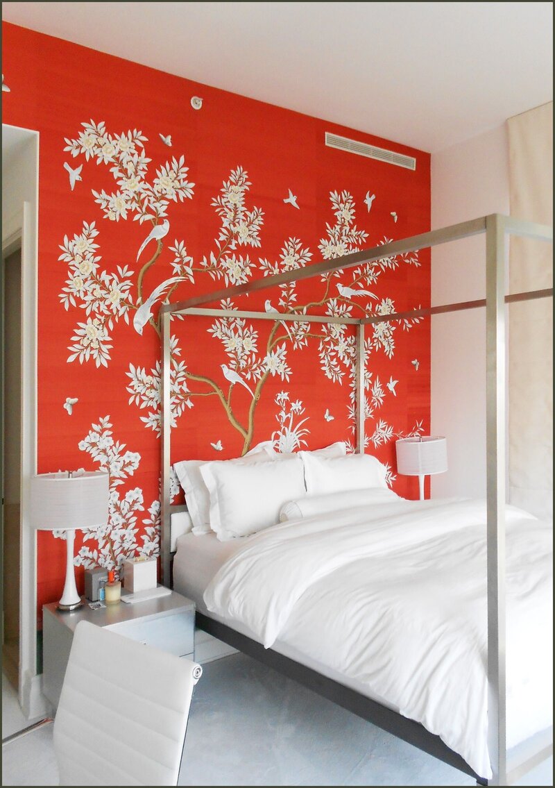Contemporary penthouse guest bedroom with red wallpaper