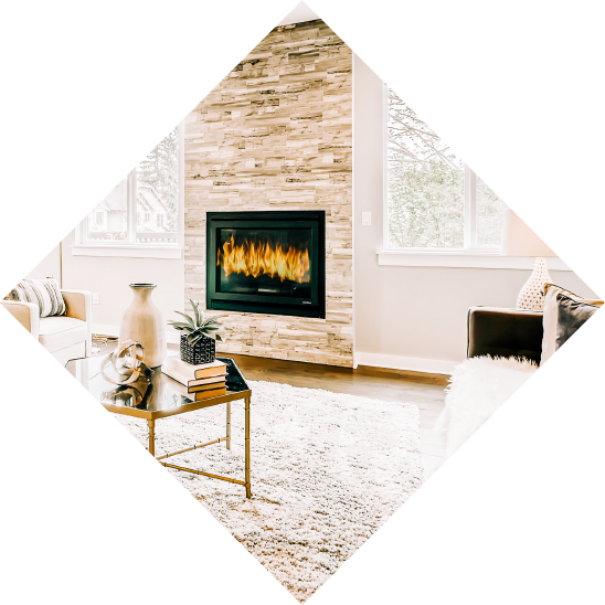A gas fireplace in a staged living room