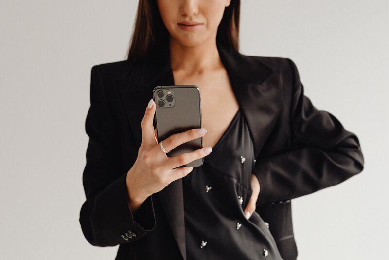 girl looking at her phone