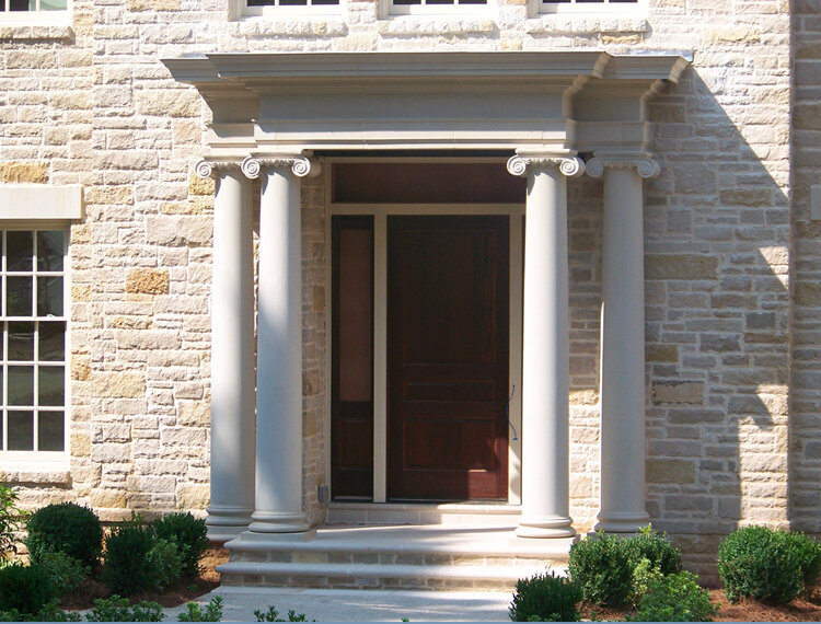 Traditional Architecture front entryway with cast stone columns