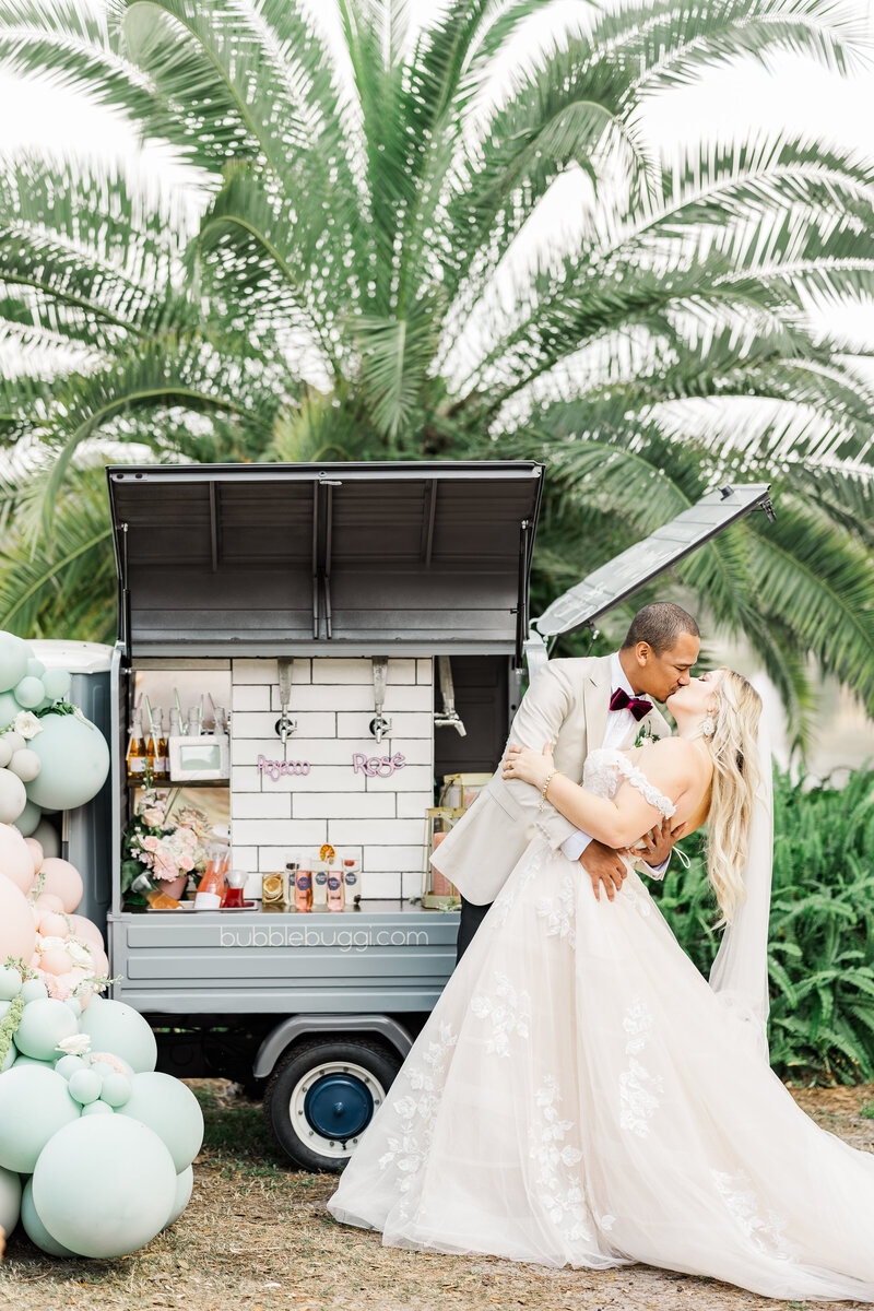 Mission Inn Blush and Baby Blue Wedding with Bubble Buggi Champagne Cart