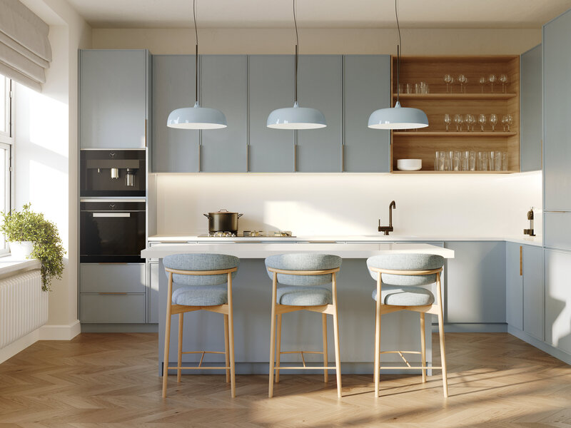 Kitchen remodel with baby seats and lighting to match the cabinetry with light wood shelving and flooring.