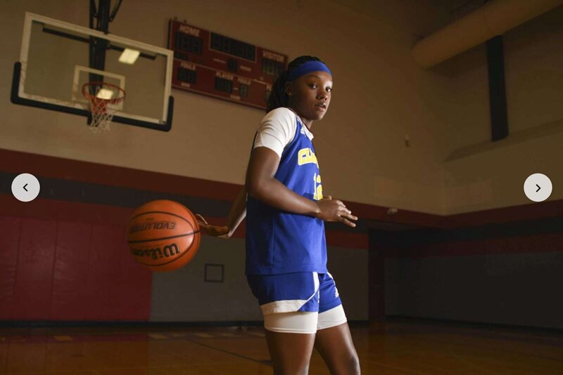 Personal trainers standing on road
