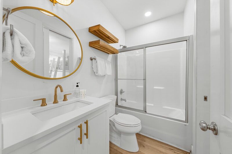 Modern full bathroom with coastal finishes at Beach Cabana, a stylish Panama City Beach vacation rental perfect for families and bachelor groups.
