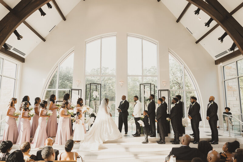 Swank Soiree Dallas Wedding Planner Jamie and Dwayne at The Bowden Wedding Venue - Exchanging vows at the ceremony