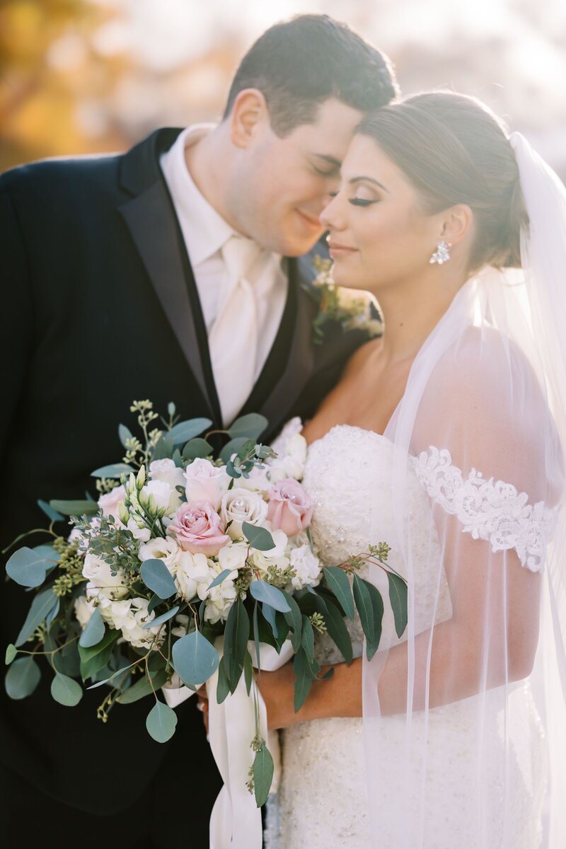 Bride and groom walk up memorial steps at their DC wedding