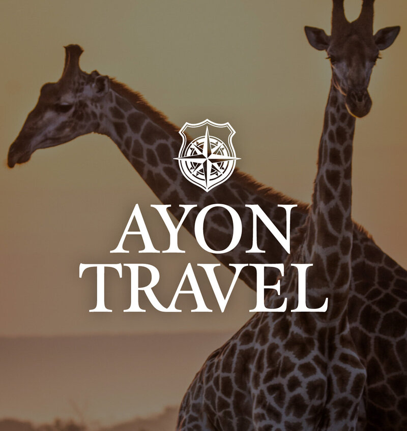 Micaela spinning and laughing in front of a colorful wall at Union Cowork in Encinitas, California