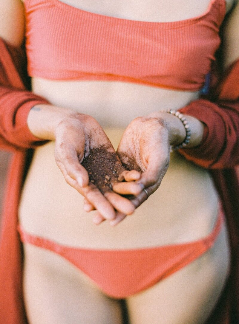 maui soil rust colored swimsuit photo shoot