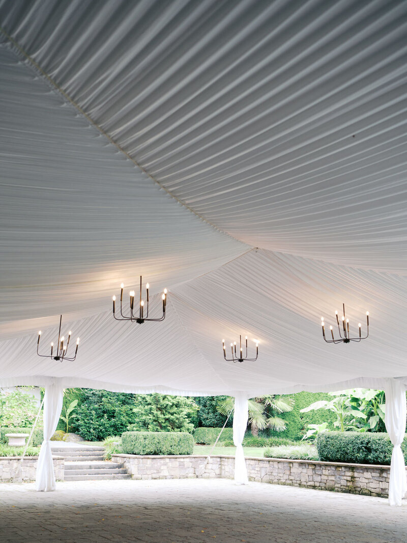 Elegant white tent with chandeliers