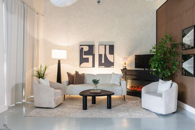 Styled living room at Lofthaus HQ, a pre-lit content studio in Houston designed for lifestyle and professional photoshoots, podcast video, and brand content.