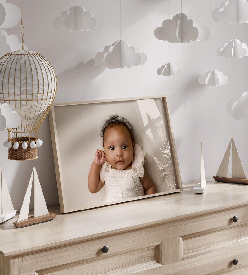 First portrait of mother with beauitful baby girl at her newborn studio session..