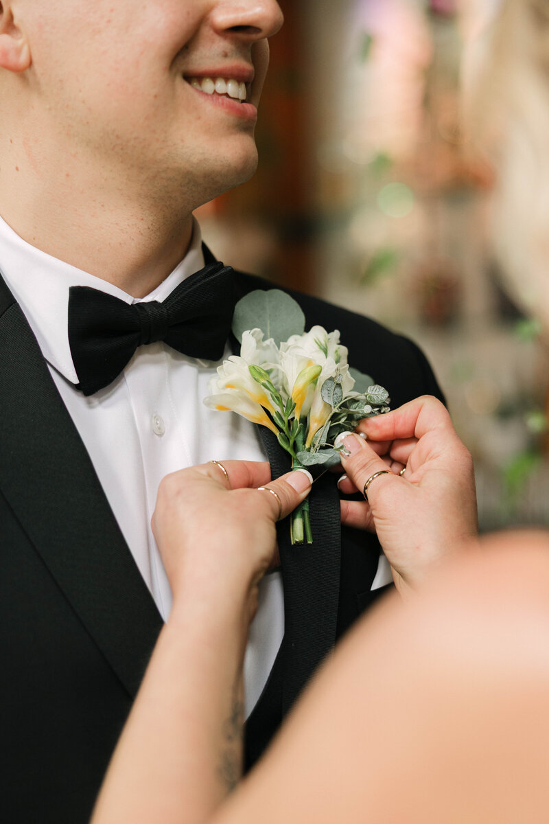 A refined groom portrait taken at the historic Brophy Chapel in Phoenix, Arizona. With warm natural light and classic composition, this image captures timeless wedding style with a subtle editorial edge.
