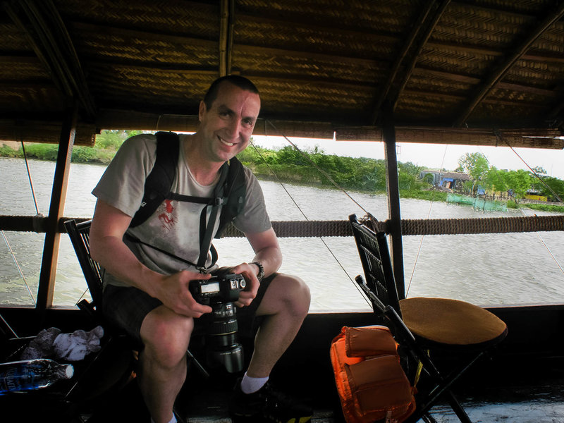 Sweaty, smiling, and totally in the zone—because when you're chasing stories from a riverboat with a camera and a backpack, every frame is an adventure waiting to happen. This is the good kind of work.

