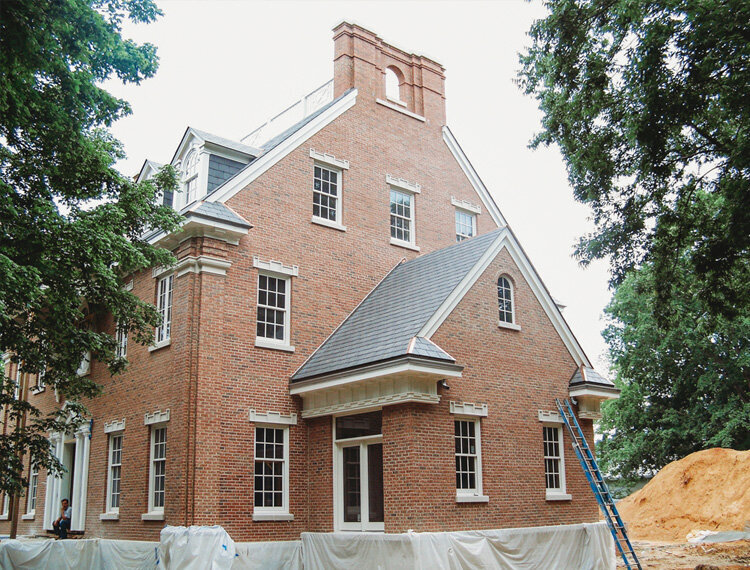 Cast stone window surrounds in a contemporary colonial home