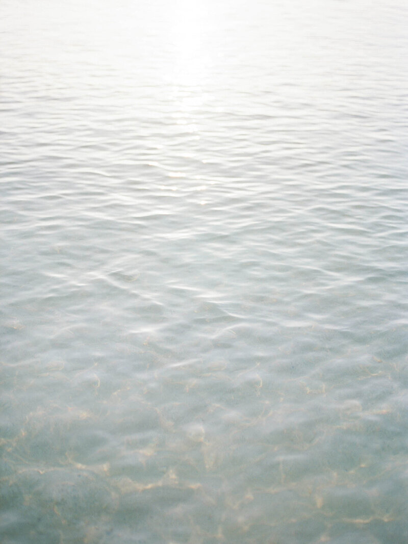 A calm sea with gentle waves, reflecting the peacefulness of nature, evoking tranquility and relaxation.