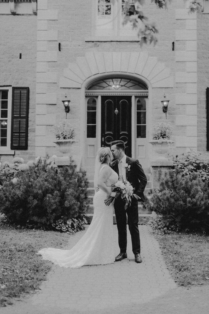 Bride and groom kissing