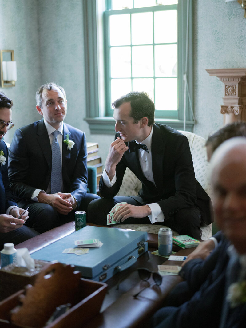 Groomsmen hanging out together before wedding ceremony